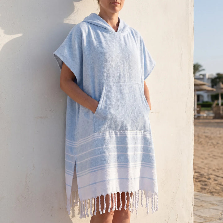 Unisex hooded towel poncho for easy beach changing. Quick-dry microfiber swim cover-up.