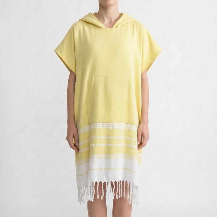 Wearable hooded beach towel poncho. Provides privacy for changing after water activities.