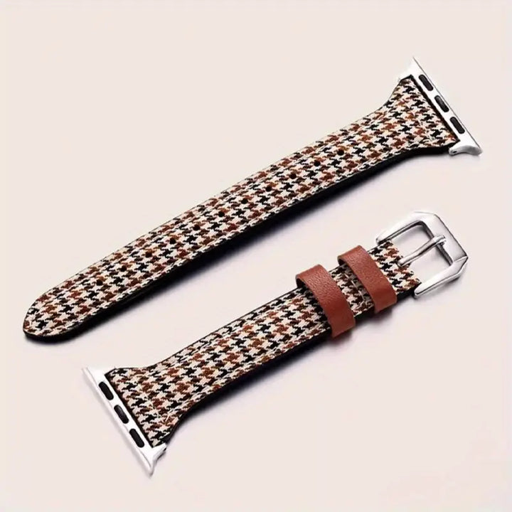 Unisex houndstooth smartwatch band, classic modern style. Comfortable, adjustable watch accessory for everyday wear.