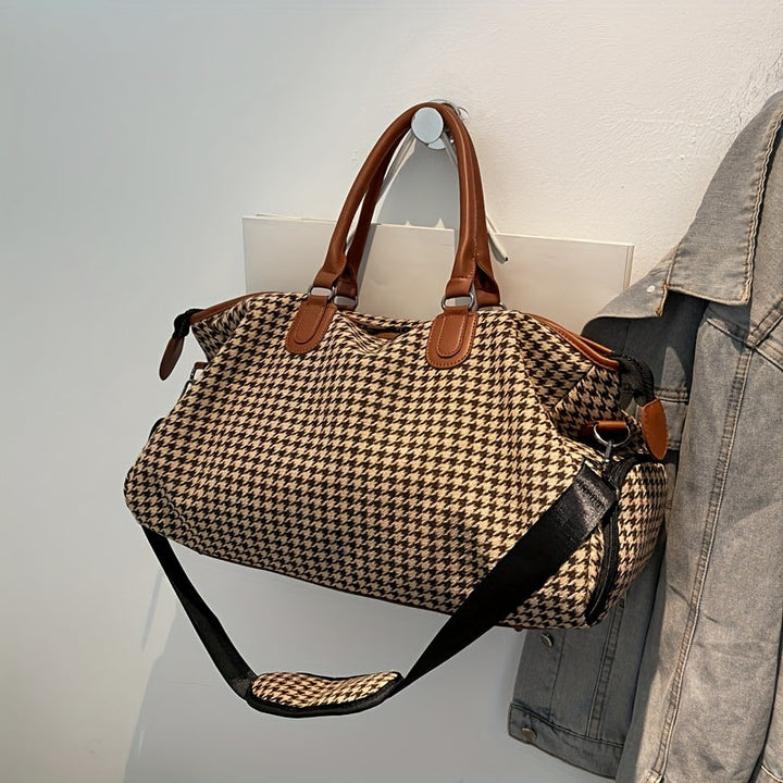 Spacious unisex houndstooth weekender travel bag for short trips. Durable vegan leather carry-on luggage.