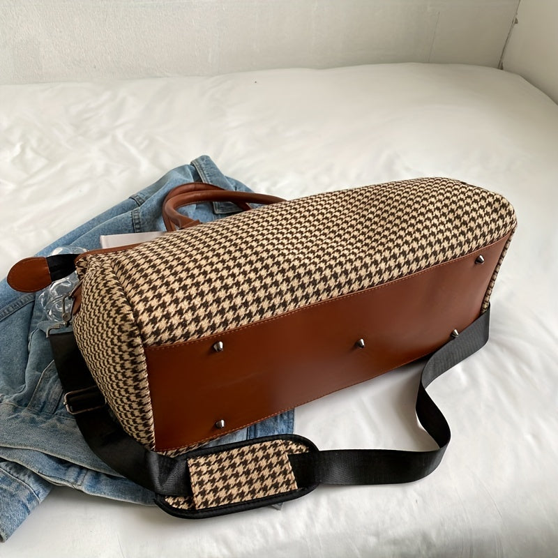 Compact unisex houndstooth weekender travel bag, ideal carry-on. Durable black & brown vegan leather luggage for trips.