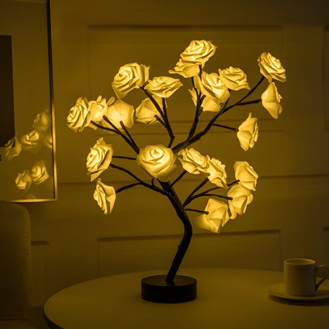 Home accent rose tree lamp, LED illuminated, with flexible branches for versatile styling.
