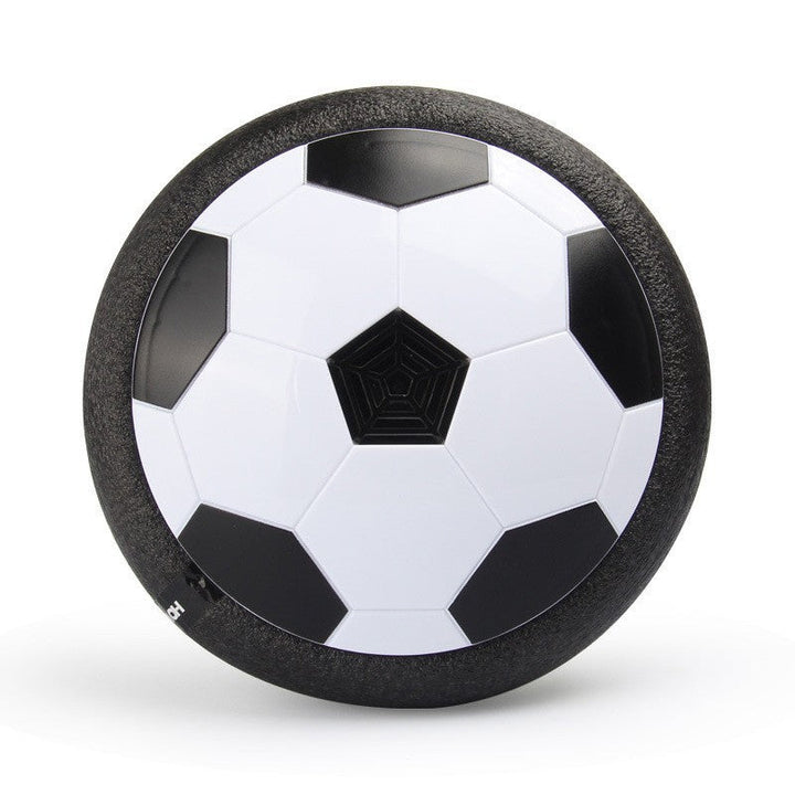 Kids playing with glowing LED hover football ball, great for indoor active play & safe on all floor types.