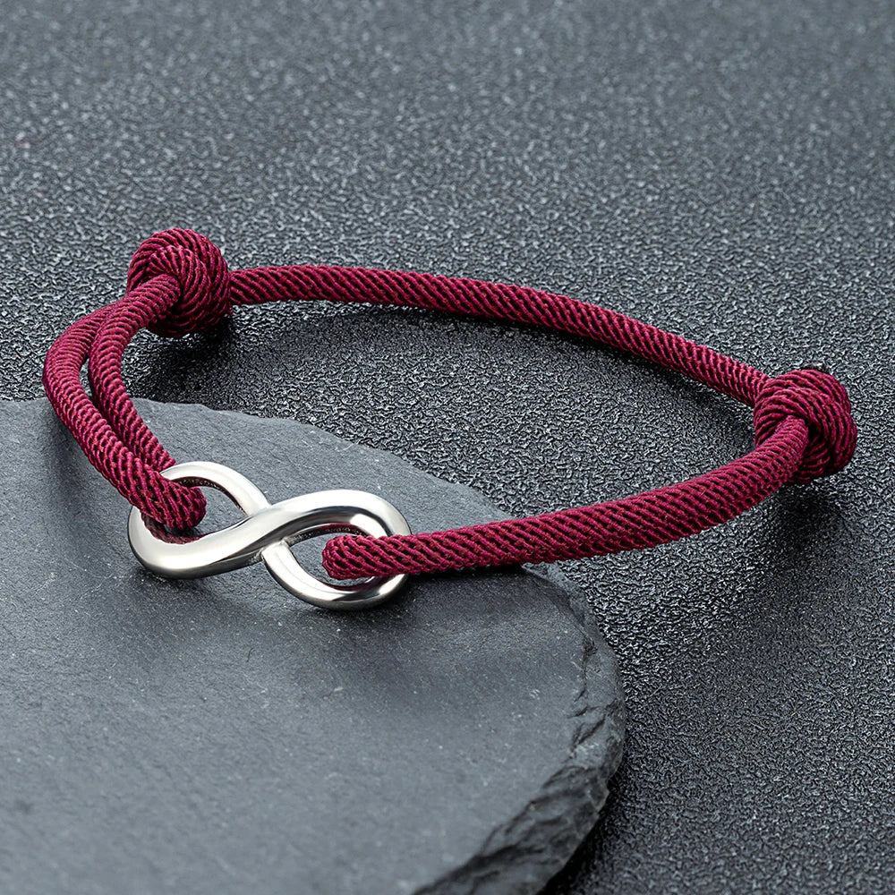 Minimalist infinity cord bracelet; adjustable stainless steel for lasting connection & style.