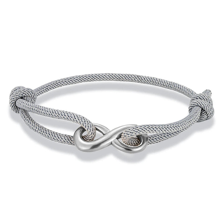 Sleek minimalist infinity cord bracelet, adjustable stainless steel; unisex jewelry for any occasion.