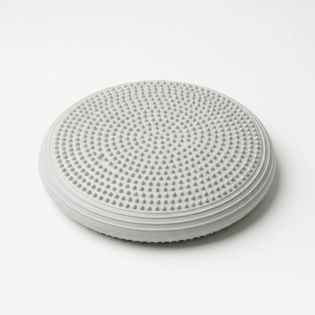 Inflatable balance cushion, perfect for Pilates & Yoga. Enhances core stability, posture, and strength during exercise.