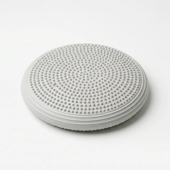 Inflatable balance cushion, perfect for Pilates & Yoga. Enhances core stability, posture, and strength during exercise.