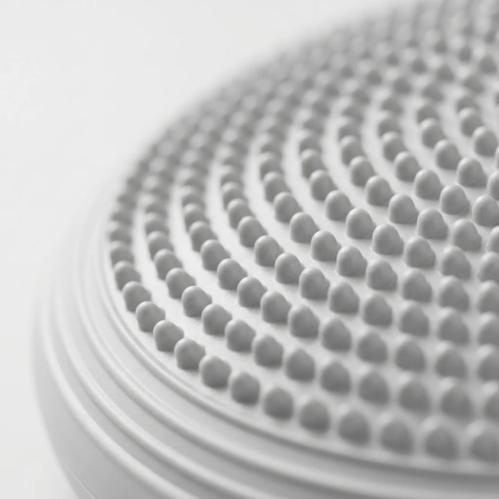 Round stability disc for physical therapy & rehabilitation. Improves balance, coordination, and muscle recovery.