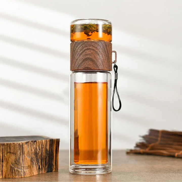 Stay hydrated with this reusable insulated glass water bottle & tea infuser, great for hot tea or refreshing cold water.