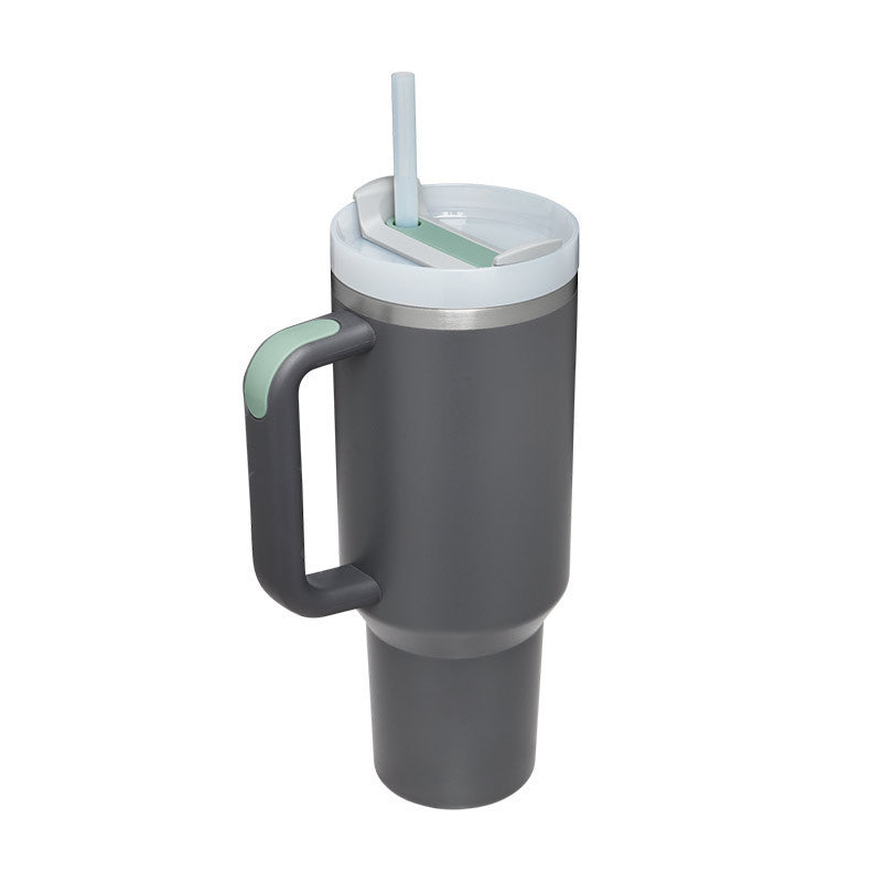 Unisex insulated travel cup with handle & straw. A versatile solution for hot and cold liquids.