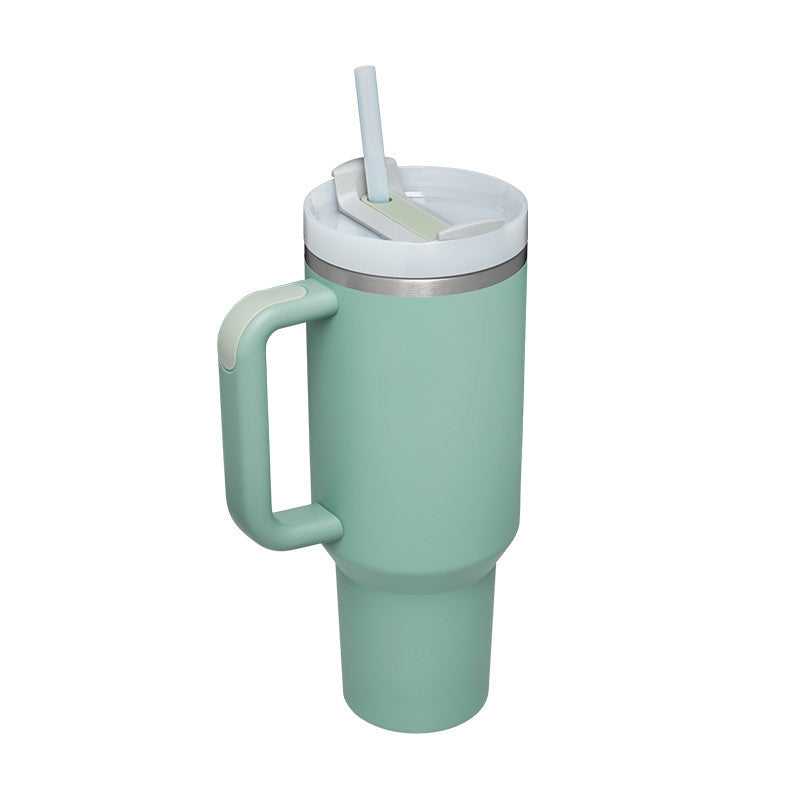 Durable insulated coffee cup with handle & straw. Enjoy your favorite hot or cold brew.