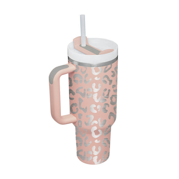 Portable thermal coffee cup with handle & straw. Keeps beverages hot on chilly mornings.