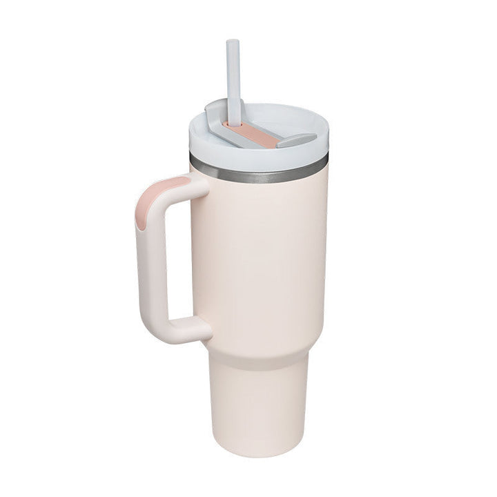 Durable insulated coffee mug with handle & straw. Built to last and keep drinks fresh.