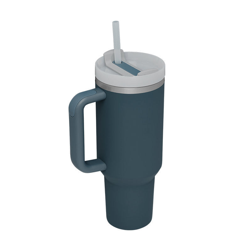 Modern insulated water mug with handle & straw. Stay hydrated with hot or cold drinks.
