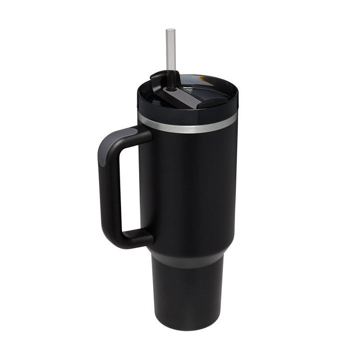 Stylish thermal coffee mug with handle & straw for easy sipping. Enjoy warm or cool drinks.