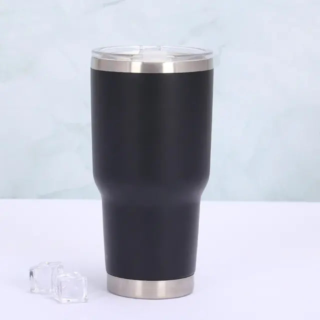 Vibrant orange insulated travel mug with leak-proof sliding lid. Perfect portable thermos for hot or cold beverages.