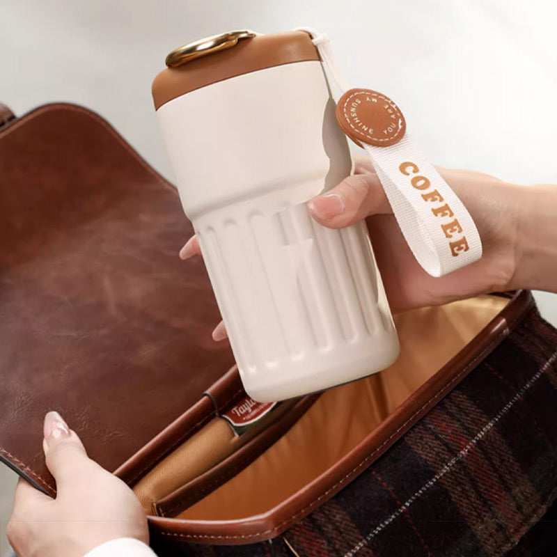 Portable Insulated Coffee Mug, perfect for hot tea or cold beverages. Leak-proof and durable for office & outdoor use.