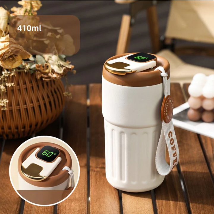 Versatile Insulated Travel Mug. Keep drinks hot or cold with smart temperature display. Perfect for office & outdoor.