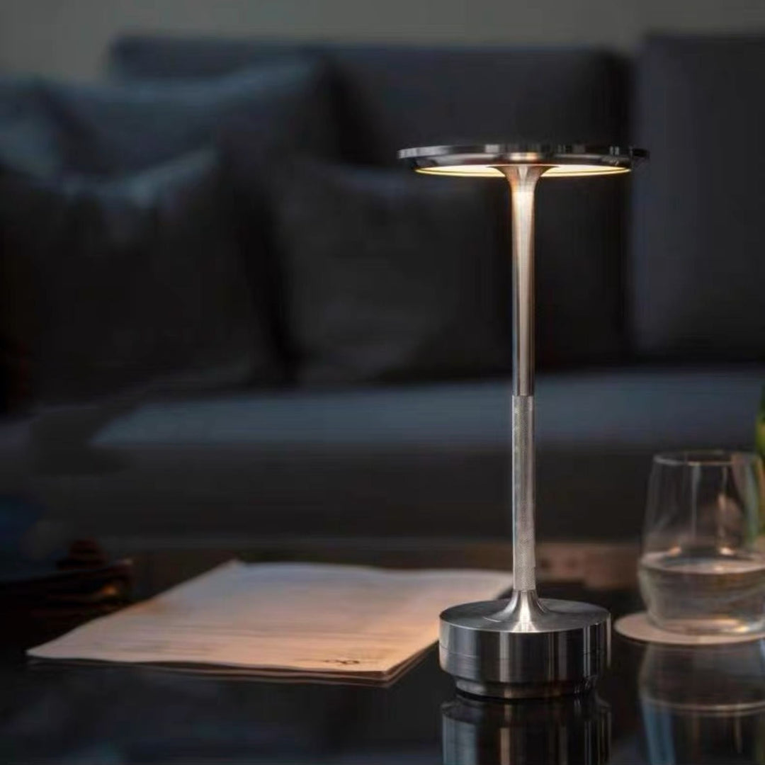 Elegant Japanese style LED table lamp; minimalist design provides warm ambient light for home decor.