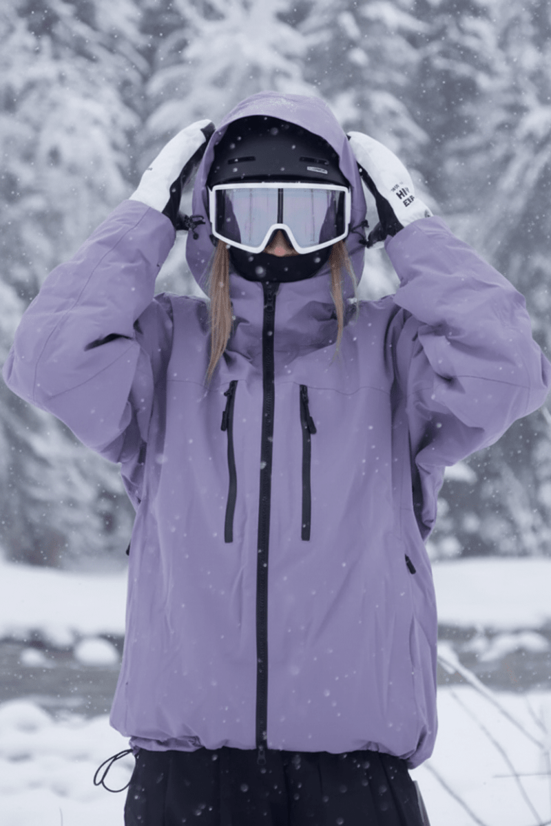 Back view of the Jesse unisex ski & snowboard jacket. Ergonomic design for cold weather active performance.