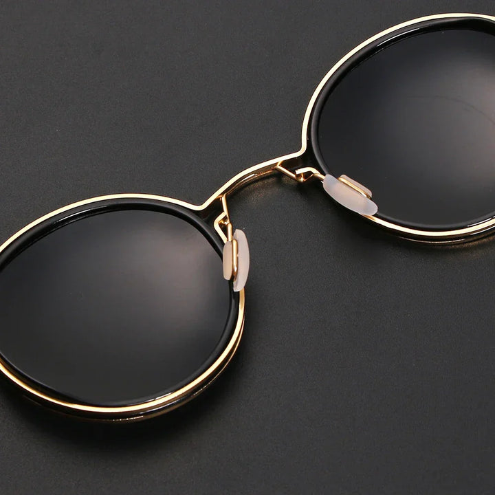 Close-up of Jetset polarized sunglasses, highlighting the sleek metal frame and glare-reducing lenses.