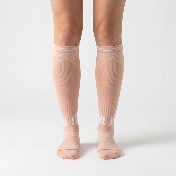Activewear unisex knee-high compression socks for running, sports, and post-workout recovery. Boosts leg support.