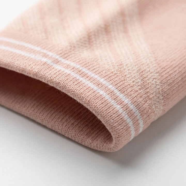 Travel-friendly unisex knee-high compression socks for improved leg circulation, reducing swelling & discomfort.