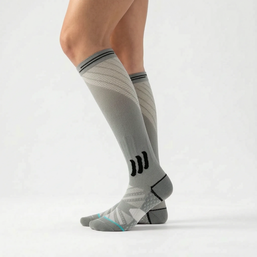 Graduated knee-high compression socks, unisex, for leg support, blood circulation, & athletic performance.