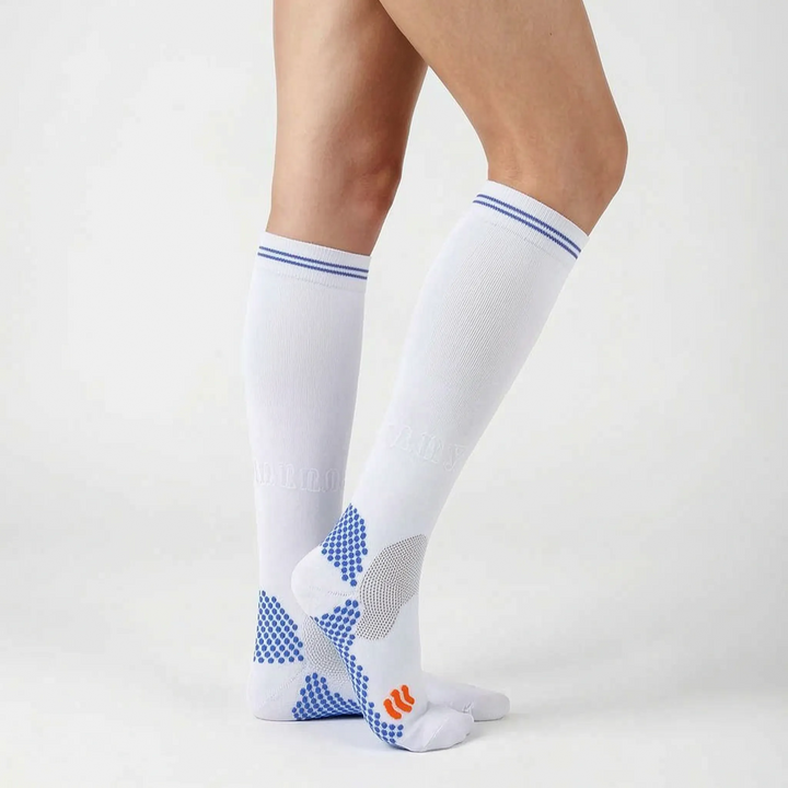 Performance-enhancing knee-high compression socks for men & women, essential activewear workout gear.