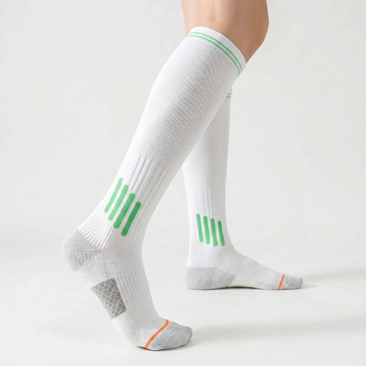 Knee-high athletic socks with superior arch support for running & high-intensity workouts. Unisex performance gear.