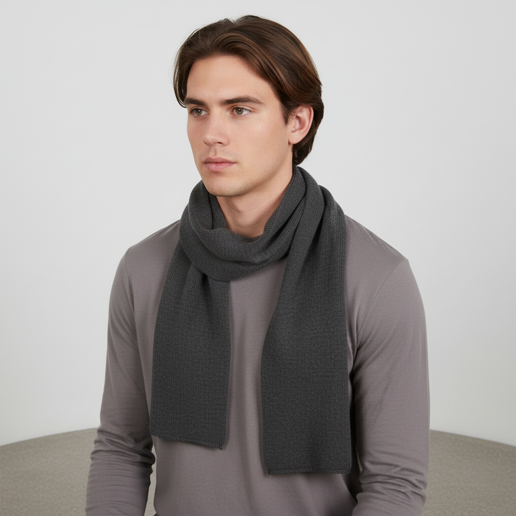 Unisex winter scarf, knitted from cashmere blend, offering comfort and style.