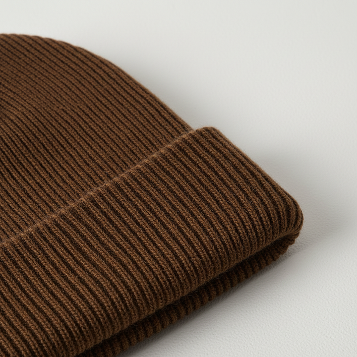 Warm acrylic one-size beanie in navy blue, ideal for cold weather