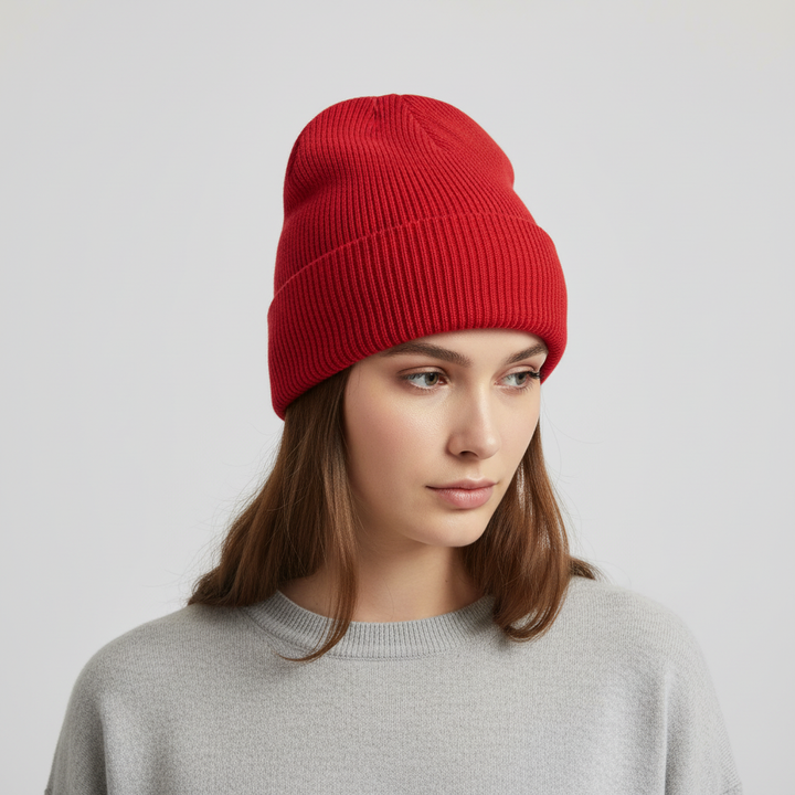 Unisex knitted one-size beanie in beige, perfect for everyday cold weather style