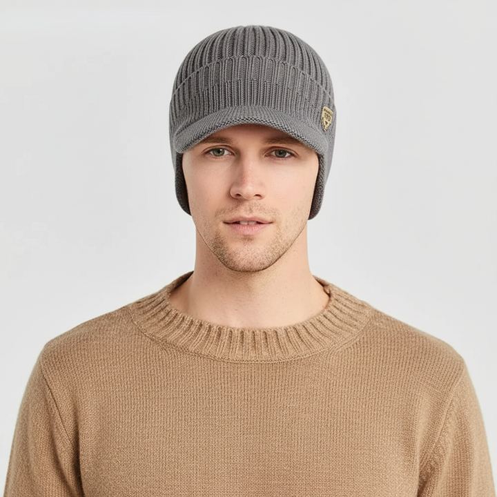 Outdoor essential: a chunky knit unisex beanie with ear flaps, ideal for diverse cold weather styles