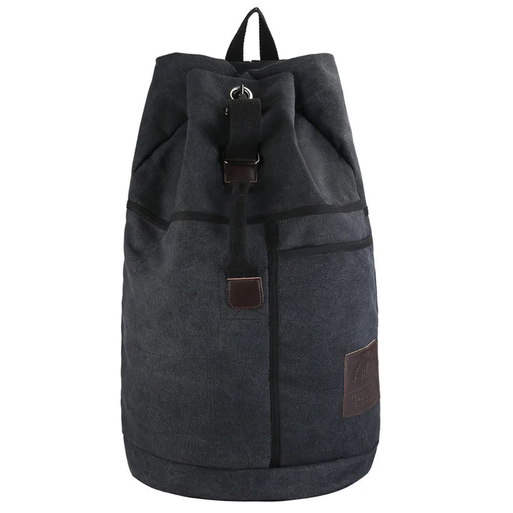Khaki canvas rucksack, spacious & durable for travel and hiking. A versatile outdoor gear.