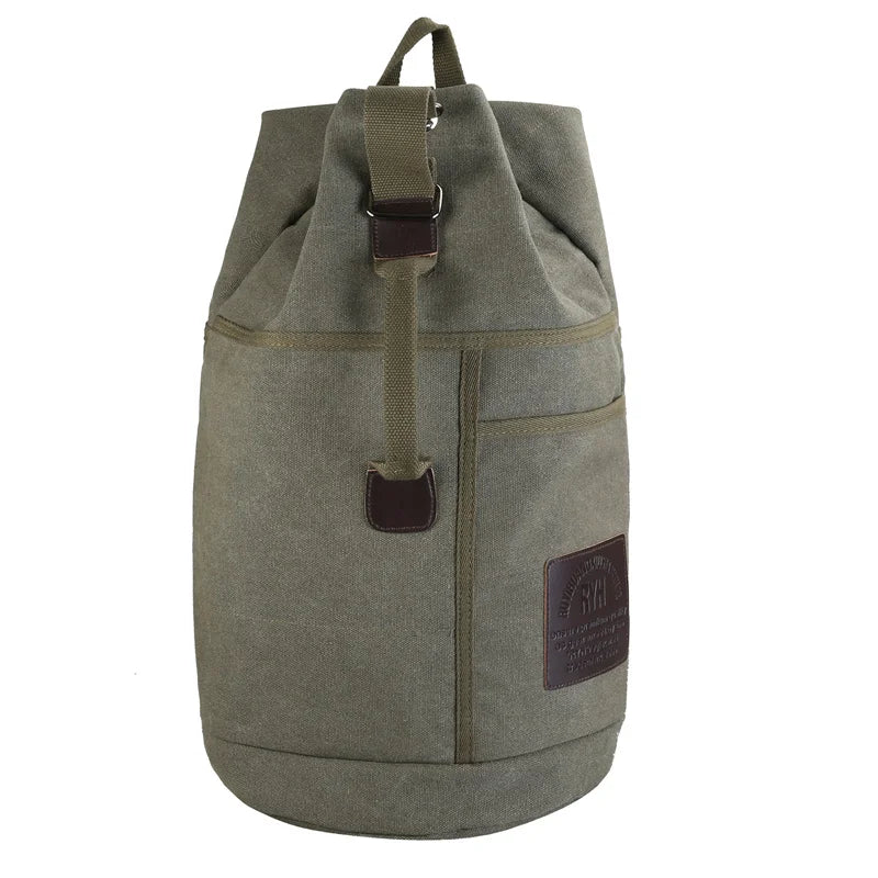 Detail of the durable canvas material on a large capacity travel backpack, suitable for all genders.