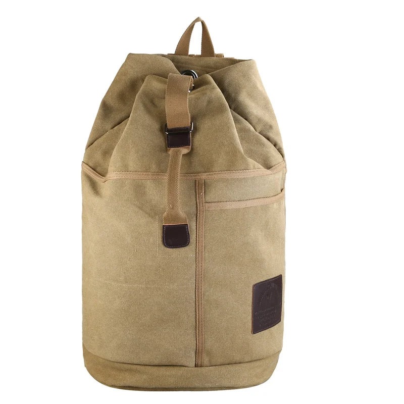 Canvas travel backpack with multiple compartments, highlighting its large capacity for organized packing.