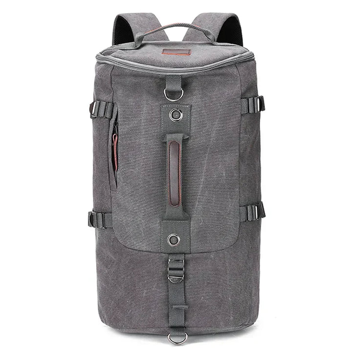 Unisex utility canvas backpack, army green, packed for travel, highlighting its spacious design