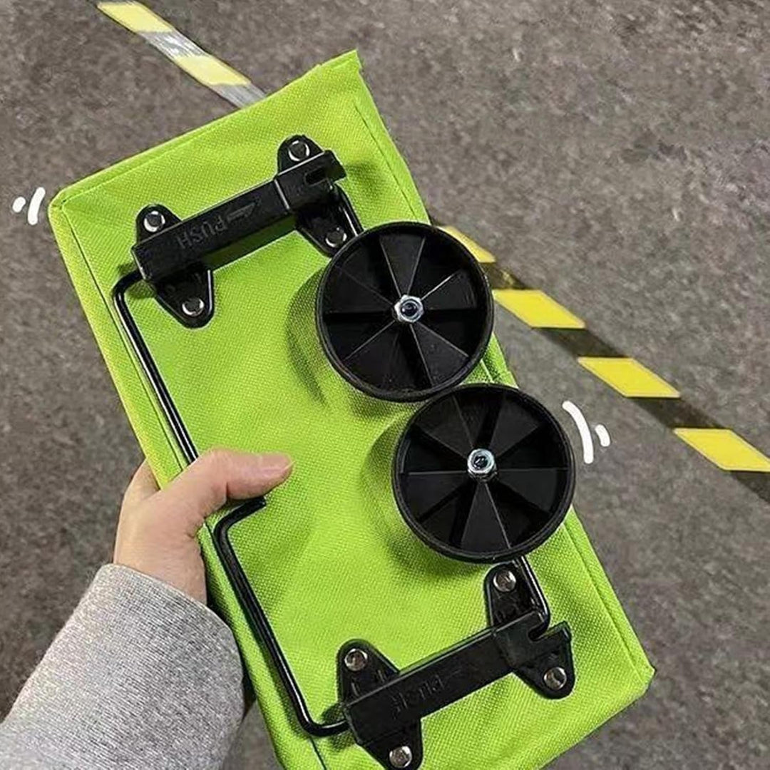 Foldable shopping bag, blue, shown being effortlessly pulled up a small curb with wheels