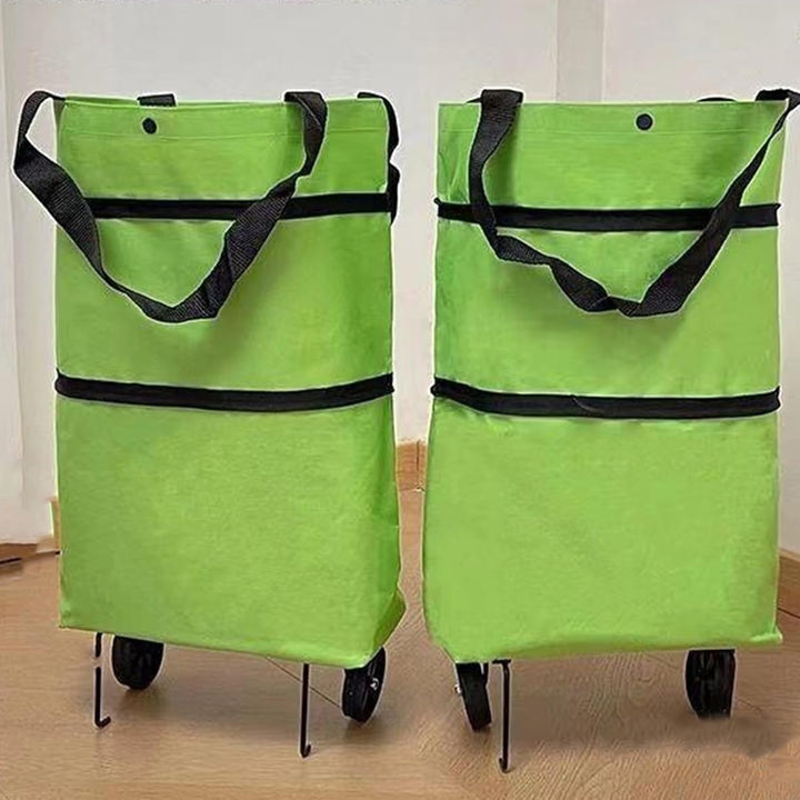 Veytra foldable shopping cart, gray, with a woman packing a week's worth of groceries into it
