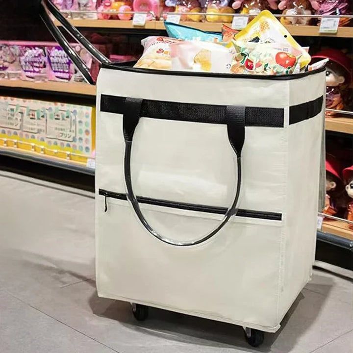Foldable wheeled shopping bag, black, collapsed for easy storage, demonstrating portability