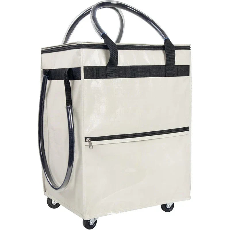 Foldable travel bag with wheels, black, with luggage in background, suitable for trips, compact design