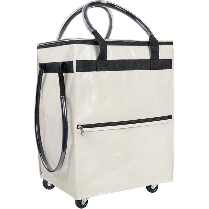 Foldable travel bag with wheels, black, with luggage in background, suitable for trips, compact design
