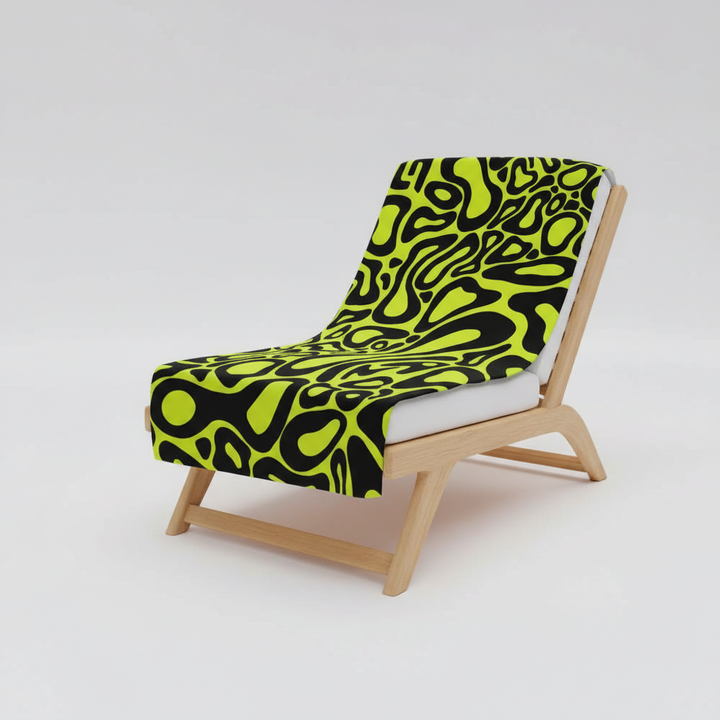Close-up of a vibrant, lightweight cotton beach towel, ideal for travel and quick drying.