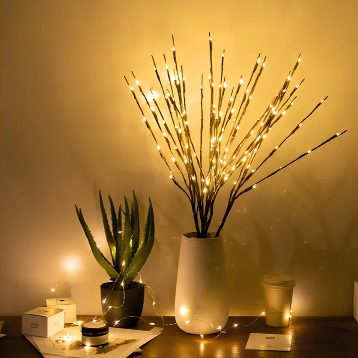 Close view of a single LED lit branch, highlighting its delicate and decorative nature