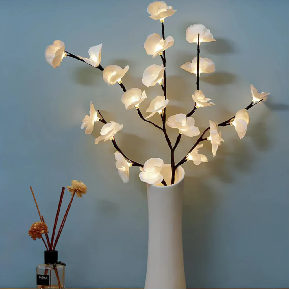 LED illuminated branches for event decor, creating a magical festive atmosphere