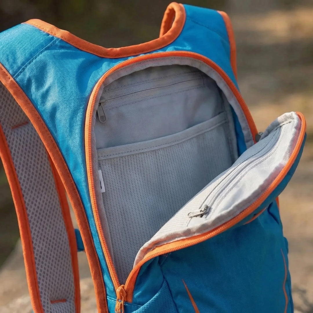 Unisex 12L hydration backpack, essential gear for active outdoor sports like hiking, running & biking.