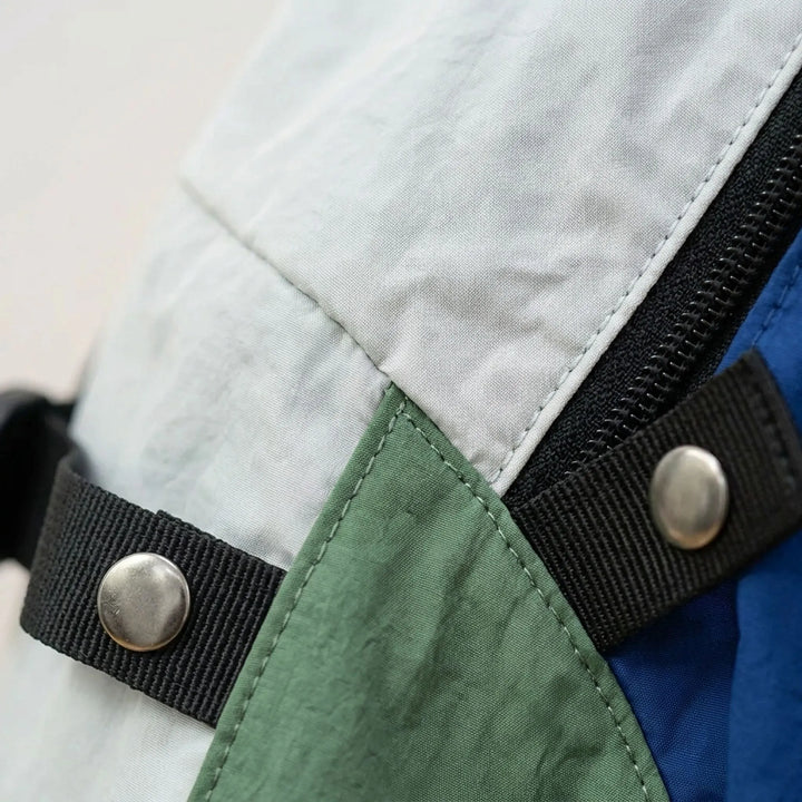 Versatile unisex daypack, ideal for hiking, travel, and daily commuting. Features a durable, lightweight design.
