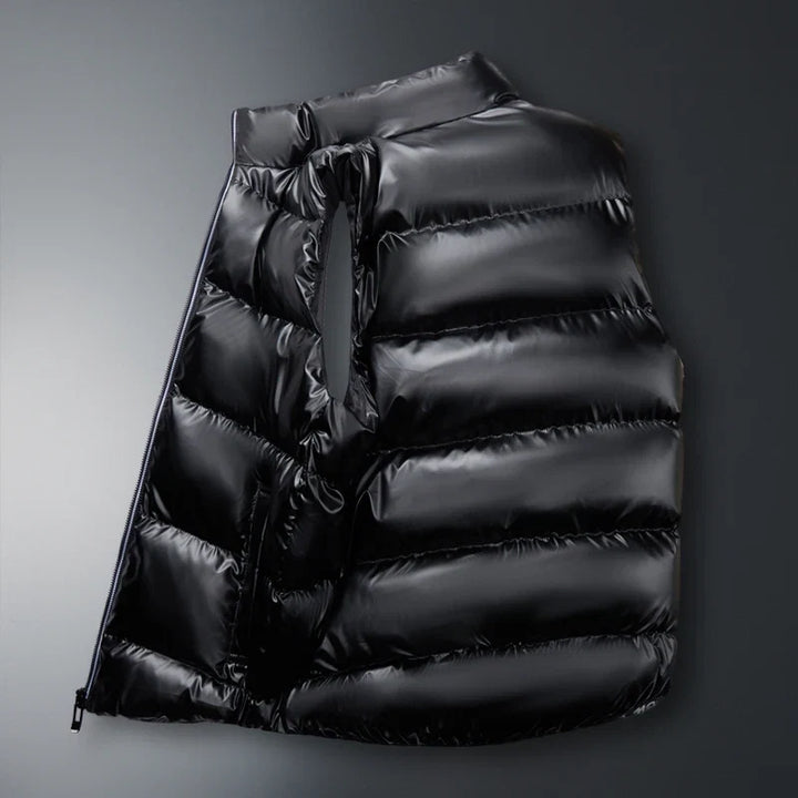 Outdoor ready unisex puffer vest. Lightweight down insulation ensures warmth for any winter adventure.
