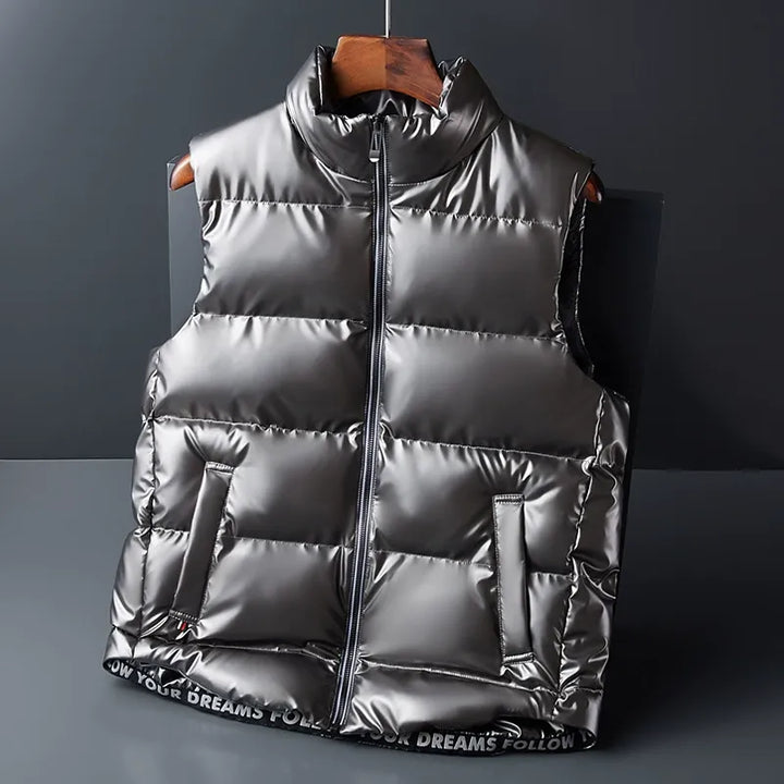 Warm insulated puffer vest, unisex design. Ideal lightweight down outerwear for cold winter weather.